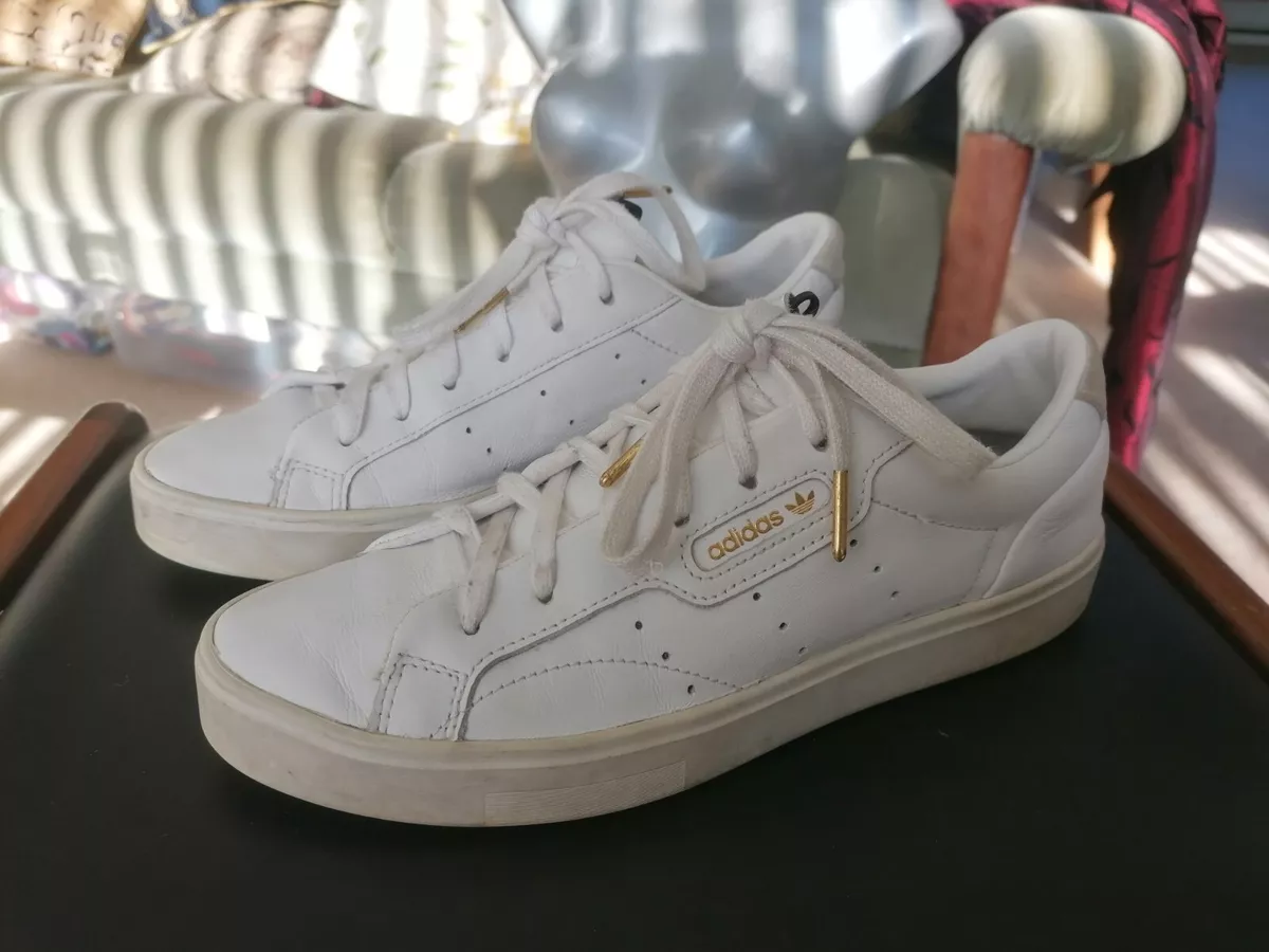 Ladies white and hotsell gold adidas trainers