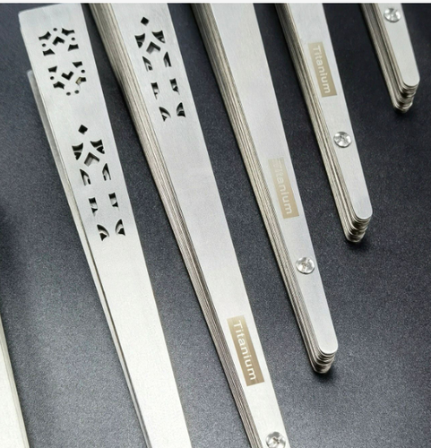 Titanium alloy folding fan with Chinese style hollow metal kung fu fan - Picture 2 of 6