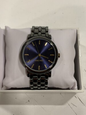 Nine West Women's Crystal Accented Gold-Tone Bracelet Watch (NW/1805),  Silver