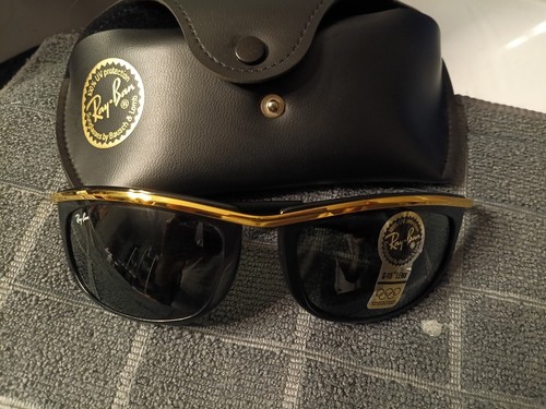 For sale is a vintage pair of black with gold trim Ray Ban sunglassesl. - Picture 4 of 4