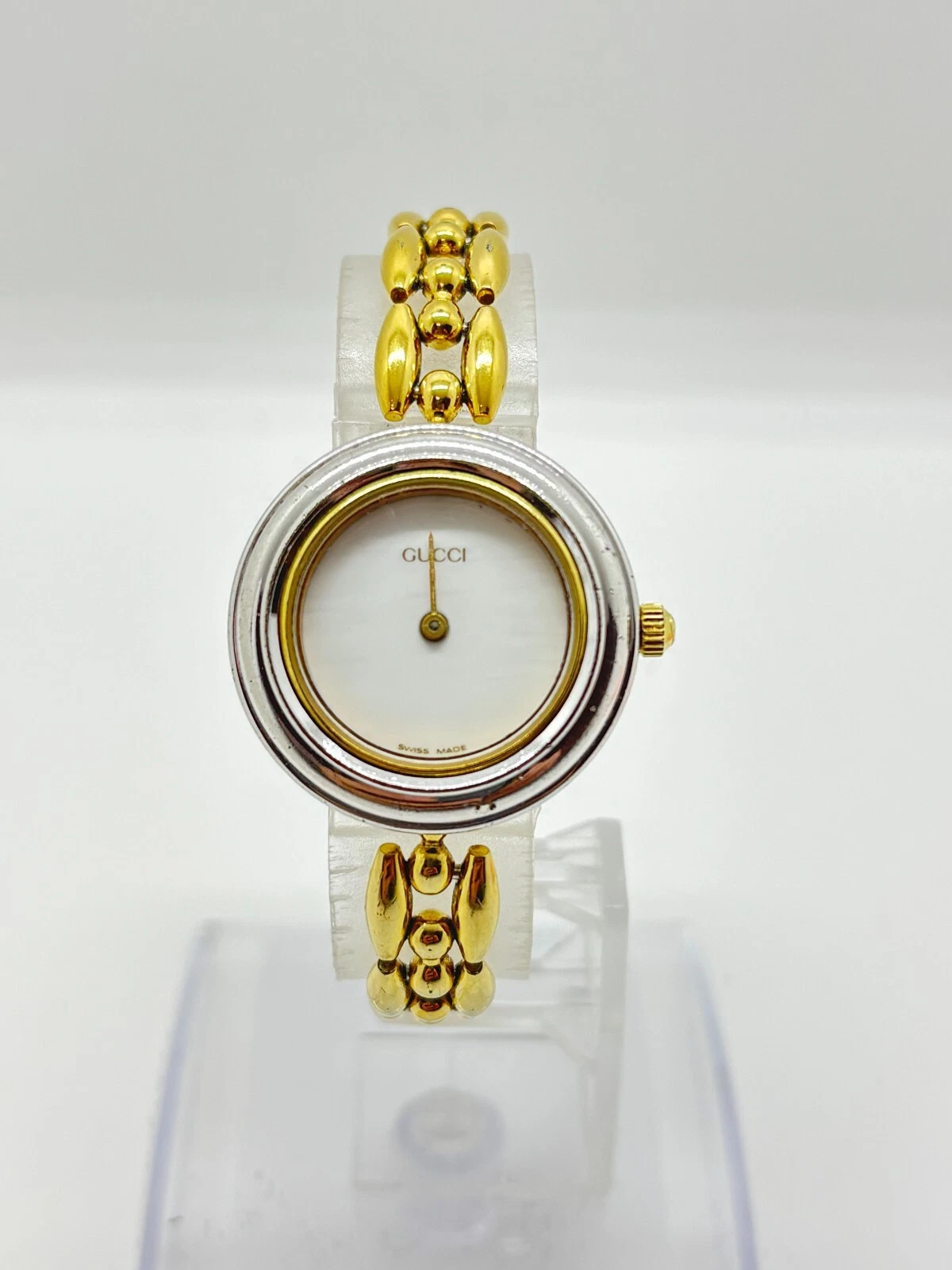 [Lire] Montre GUCCI 11/12.2 lunette changeante cadran doré argent non testée pour pièces