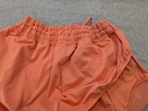 Lululemon Tracker Short Damen 10 orange gefüttert Mid-Rise Reißverschlusstaschen Athleisure - Bild 12 von 14