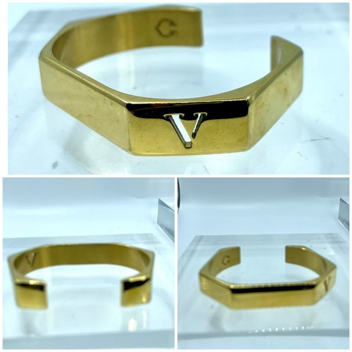 C. Wonder Women's Bangle Cuff Bracelet Gold Tone Metal Monogram Initial "V”