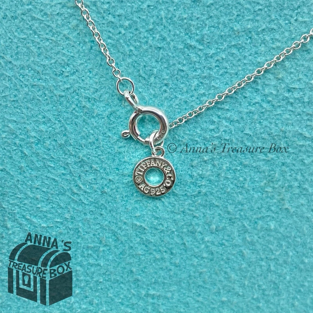 Tiffany & Co 925 Silver & Rubedo Interlocking Drop Circle