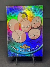  102 Exeggcute Rainbow Foil Blue Logo