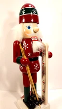 Alpine Mountain Nutcracker Skiing Gear White Furry Hair Snowflakes Red Sweater