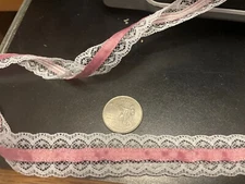 7/8 in wide white lace with mauve ribbon