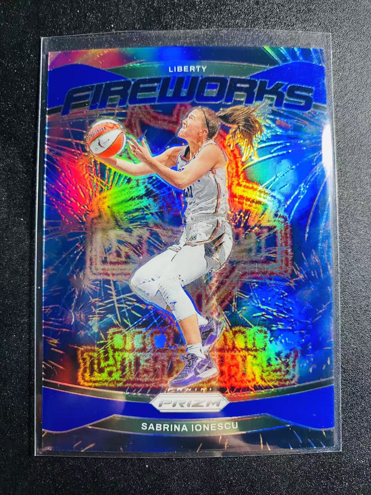 2024 Panini WNBA Prizm Fireworks Sabrina Ionescu #11 Blue Prizm /49