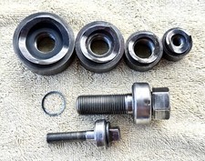 SET OF GREENLEE KNOCK OUTS ARE PICTURED AND DESCRIBED