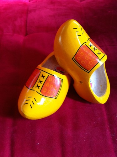 yellow wooden clogs