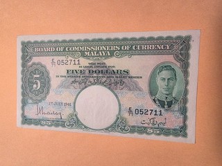 malaya banknote XF/AU . PMG 53 level AU. nice grade. my last one