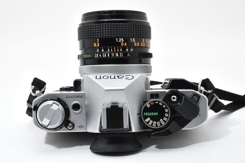 [COMO NUEVA] Cuerpo de programa Canon AE-1 35 mm SLR cámara fotográfica plateada + FD 28 mm f/2,8 s.c. sc - Imagen 22 de 24