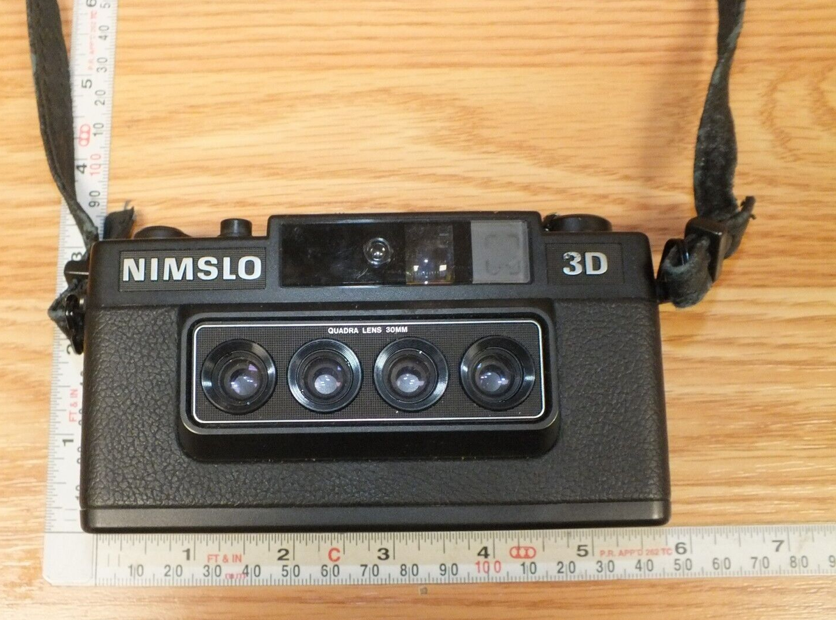 Genuine Vintage Nimslo 3D 35mm Collectible Camera With Strap Genuine Vintage Nimslo 3D 35mm Collectible Camera With Strap