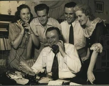 1941 Press Photo Ladies and Gentlemen talking on vintage phones - sax19854