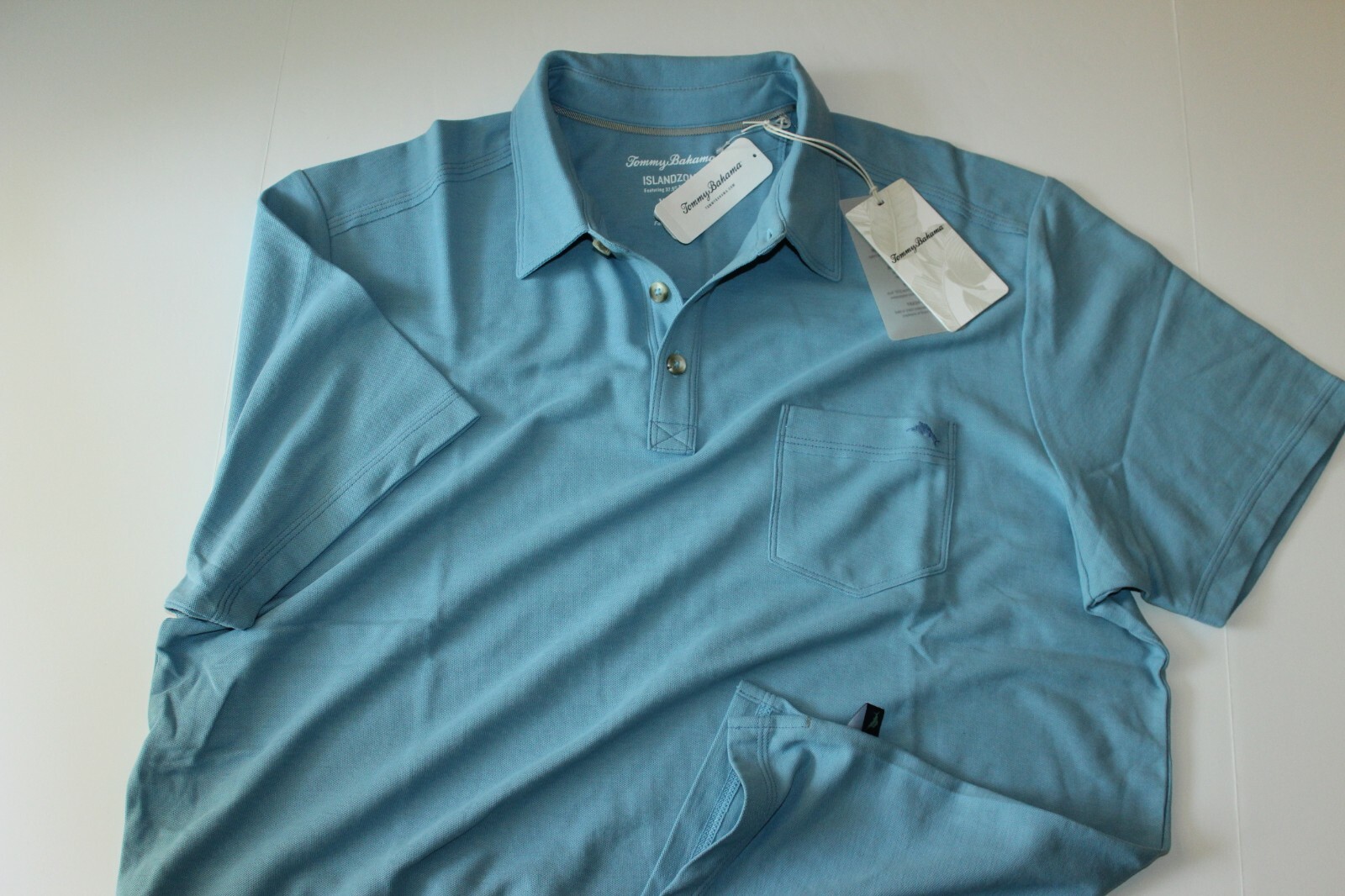 Tommy Bahama Polo Shirt Del Rey Tropicool Fire Finch T222331 Tommy Bahama Polo Shirt Del Rey Tropicool Fire Finch T222331