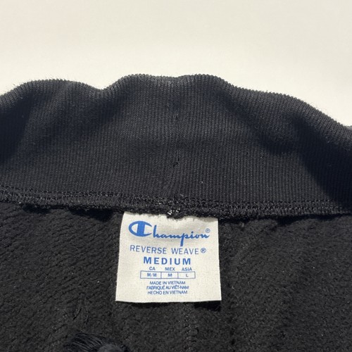 Pantalones Cortos Deportivos Champion Tejido Inverso Para Hombre Medianos Negros Estampado Completo Corte 10" - Imagen 6 de 7
