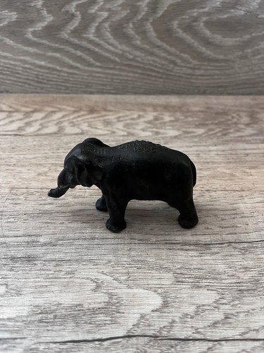 Antique Cast Iron Crane Advertising Elephant Paperweight
