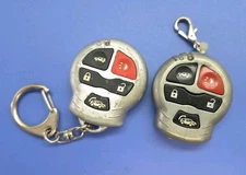 2x USED TESTED WORKING DesignTech ELGTX7 5-Button Remote Transmitter - SILVER