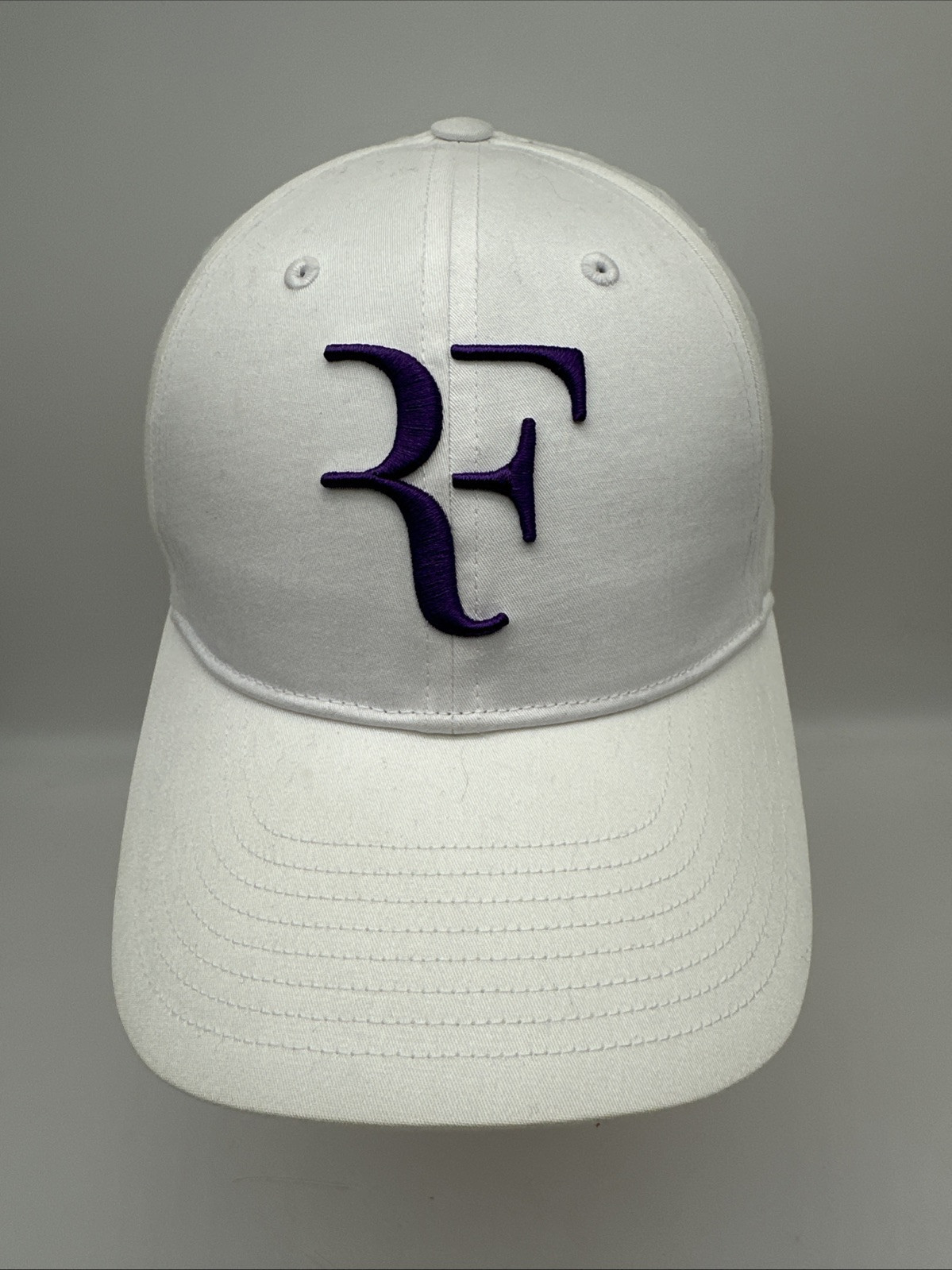UNIQLO Roger Federer RF Cap 2023 Limited Edition White and UNIQLO Roger Federer RF Cap 2023 Limited Edition White and