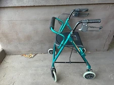 Invacare With 4 Wheels And A Seat
