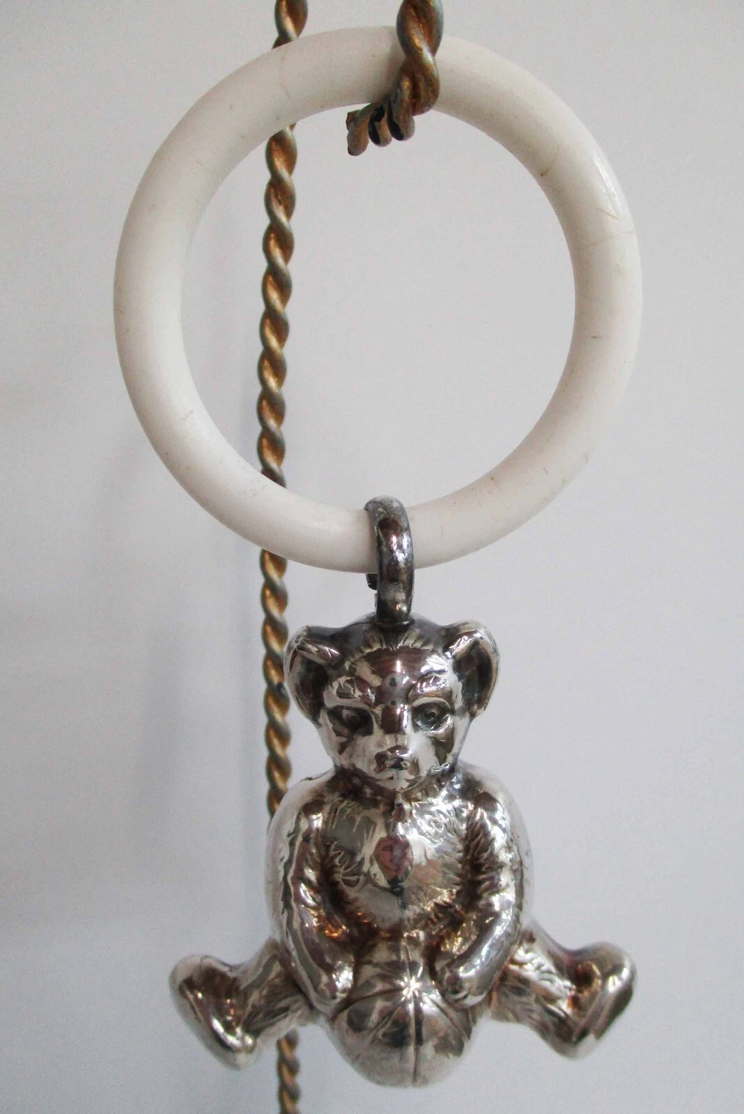 Vintage Silver Plate Bear Holds Ball Rattle Plastic Teething Ring Baby Toy 1960s