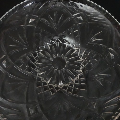 A large cut glass crystal serving bowl with a detailed starburst and geometric c - Picture 3 of 7