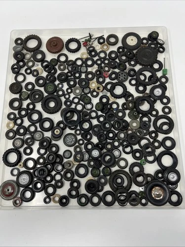 DINKY BRITAINS CORGI MATCHBOX VINTAGE BUNDLE OF WHEELS & TYRES APPROX 220