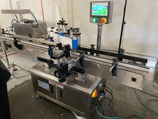 In-line Automatic Round Bottle Label Machine. High Speed, Brand New, Multi Size