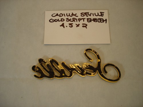 CADILLAC SEVILLE GOLD PLASTIC OEM SCRIPT EMBLEM - 4.5 X 2 - Picture 2 of 2