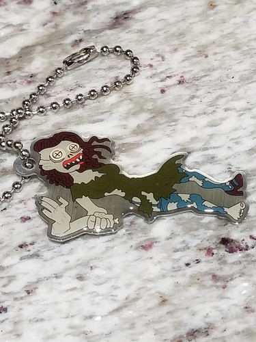 New Unactivated Geocoin - Tiffany the Zombie Cache Buddy - Picture 1 of 2