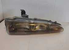 1992 ECLIPSE RH HEAD LIGHT ASSEMBLY *CLOUDY* USED OEM