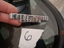 Vintage 1940s Oldsmobile Deluxe Emblem Oem Gm