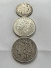 2 Silver Morgan Dollars And One Barber Half Dollar