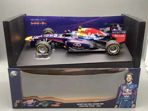 Modellautos 1:18 Minichamps BESCHÄDIGT Red Bull Racing RB9 S. Vettel 2013 in OVP