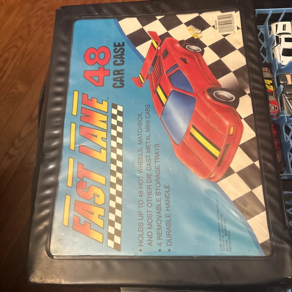 Estuche de coche de juguete Fast Lane Toy R 1990 Geoffrey 48 porta coches 4 bandejas con algunos coches Foto 2 de 4