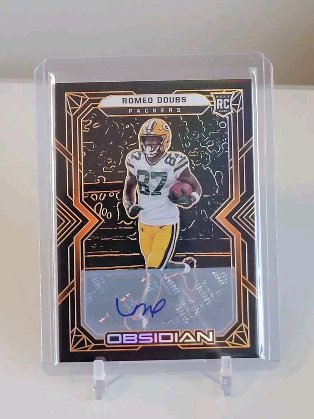 2022 Obsidian Romeo Doubs Rookie Autos RC #140 Etch Orange /75