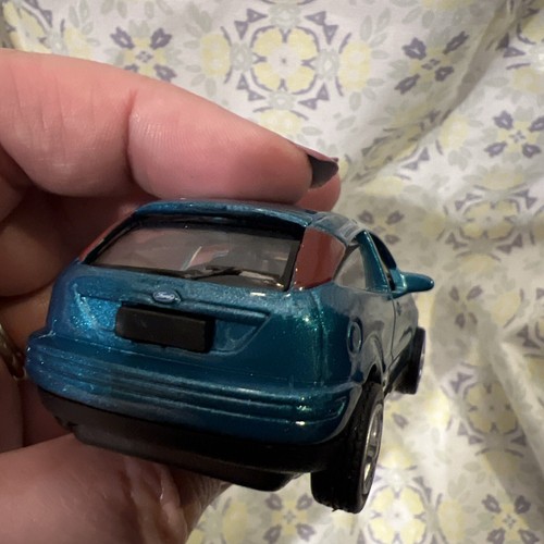 Coche diecast Ford Focus 1/43 azul turquesa verde 3,5" - Imagen 9 de 10