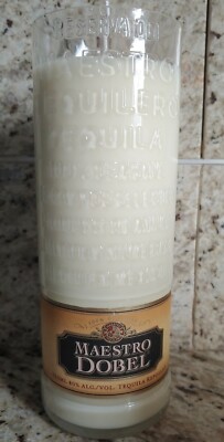 Upcycled Maestro Dobel Reposado Tequila Bottle Candle. Made with Soy Wax