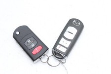 10-13 MAZDA 3 KEY FOB REMOTES PAIR E4757