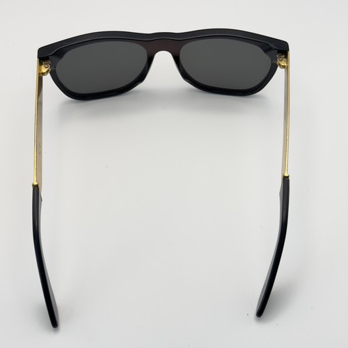 Occhiali da sole uomo retrosuperfuture montatura bordo corno nero Italia tonalità sole chic - Foto 8 di 15