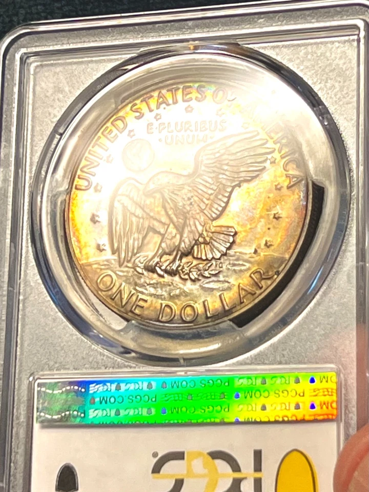 Dólar Eisenhower 1977-S PCGS PR67 revestido à prova: tom de aro colorido Obv. & Rev. - Imagem 4 de 4