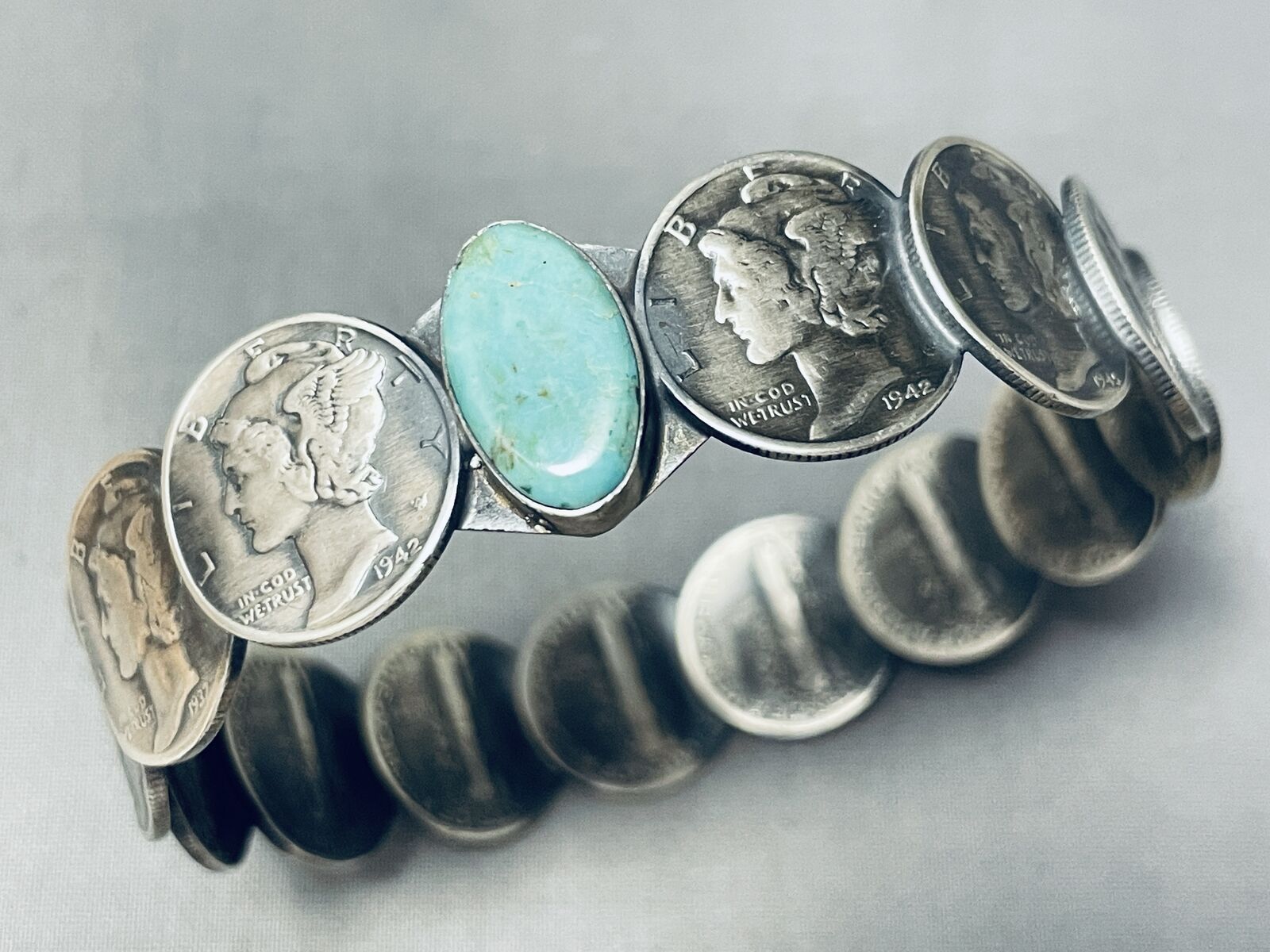 Sensational Native American Navajo Signed Royston Turquoise 14 Mercury Silver Dimes Bangle Sensational Native American Navajo Signed Royston Turquoise 14 Mercury Silver Dimes Bangle