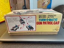 NOMURA TURN-O-MATIC GUN PATROL  POLICE CAR JAPAN BATTERY OPERATED
