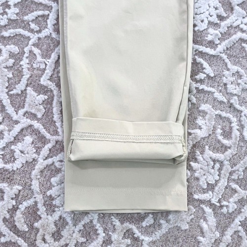 Pantalón híbrido Under Armour para mujer S Stone $60 usado en excelente estado bolsillos elásticos mínimo - Imagen 10 de 10