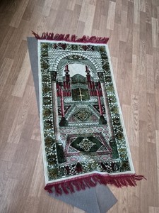 Silk Rug Size it is about 59 Inches long by 32 inches. prayer rug. Beautiful .