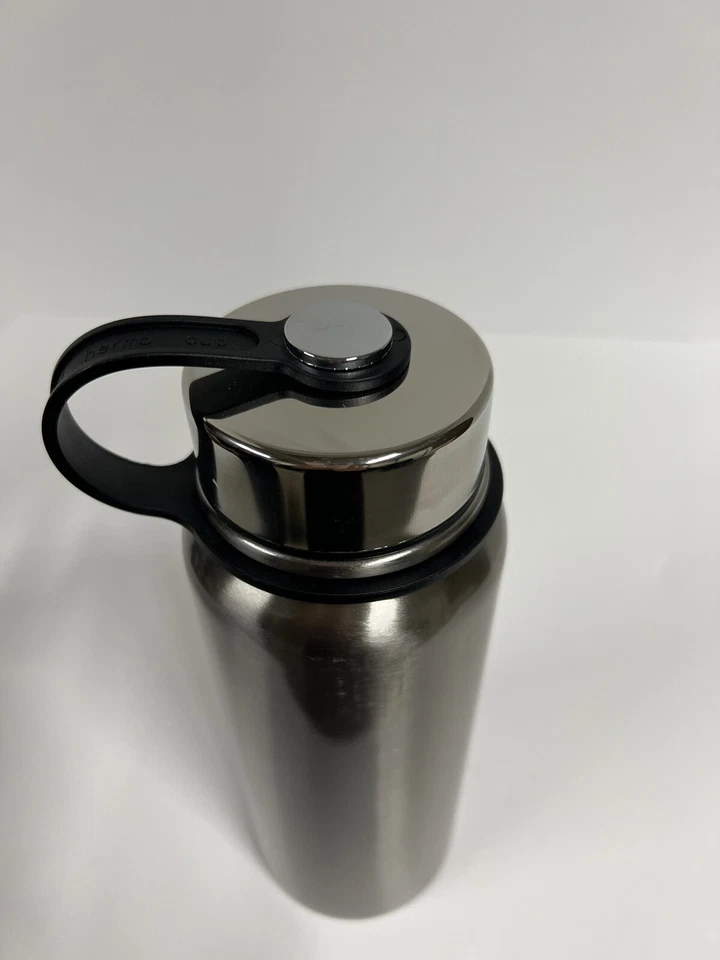 Botella de agua de acero inoxidable aislada al vacío de 20 oz, bebidas frías y calientes sin BPA Foto 4 de 4