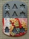 New Wilton Holiday Cookie Shapes Non Stick Baking Pan 12 Cavities 3 Designs