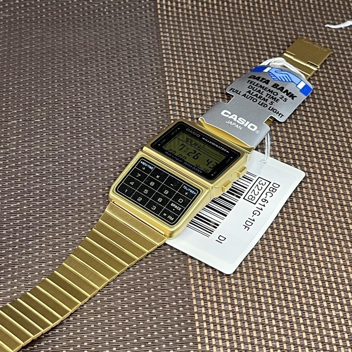 Casio DBC-611G-1D Databank Calculator Gold Tone Stainless