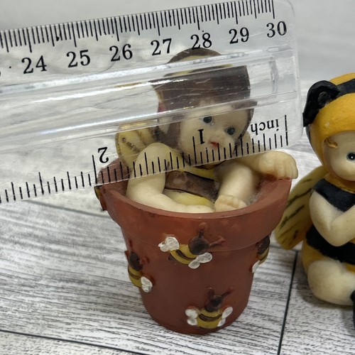 Babies Dressed as Bees One In A Flower Pot And The Other Sitting - Picture 14 of 16