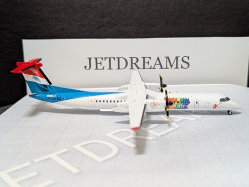 1/200 LUXAIR BOMBARDIER Q400-8 / DASH-8 BE PRIDE COLORS LX-LQC JC WINGS - Picture 5 of 9
